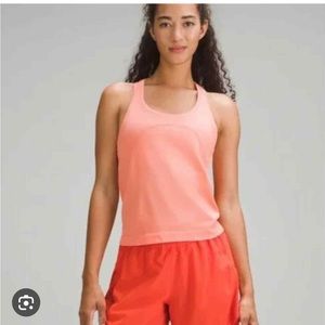 Lululemon Swiftly tank race length in Sunny Coral size 4